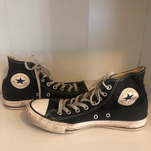 Black high top converse sneakers